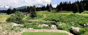 Golf Club de Courchevel | Golf Club de Courchevel, synthetic golf tee with views of the Grand Bec