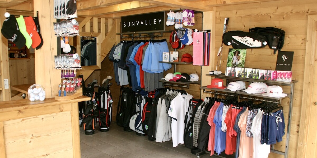 Golf shop at the Courchevel Golf Club featuring apparel, golf bags, accessories and golf equipment.