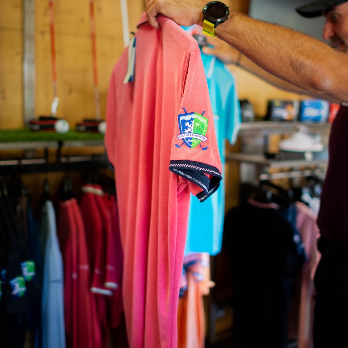Courchevel Golf Club polo shirt displayed in the Club House golf shop